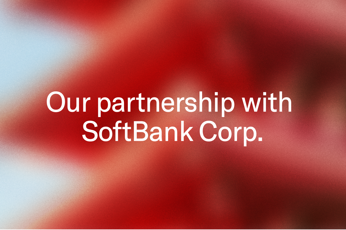 Our partnership with SoftBank Corp. on a blurred red background