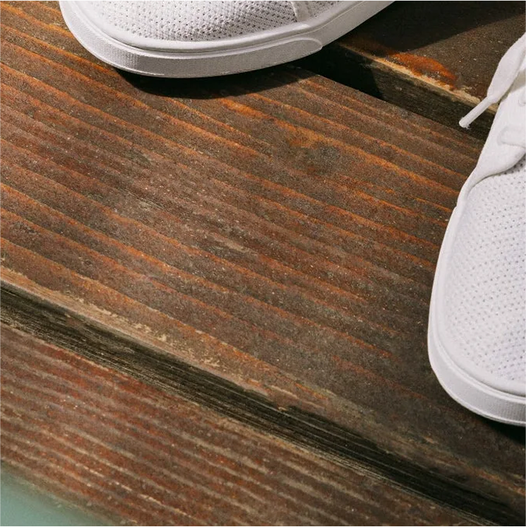 Wood floor and shoes close up