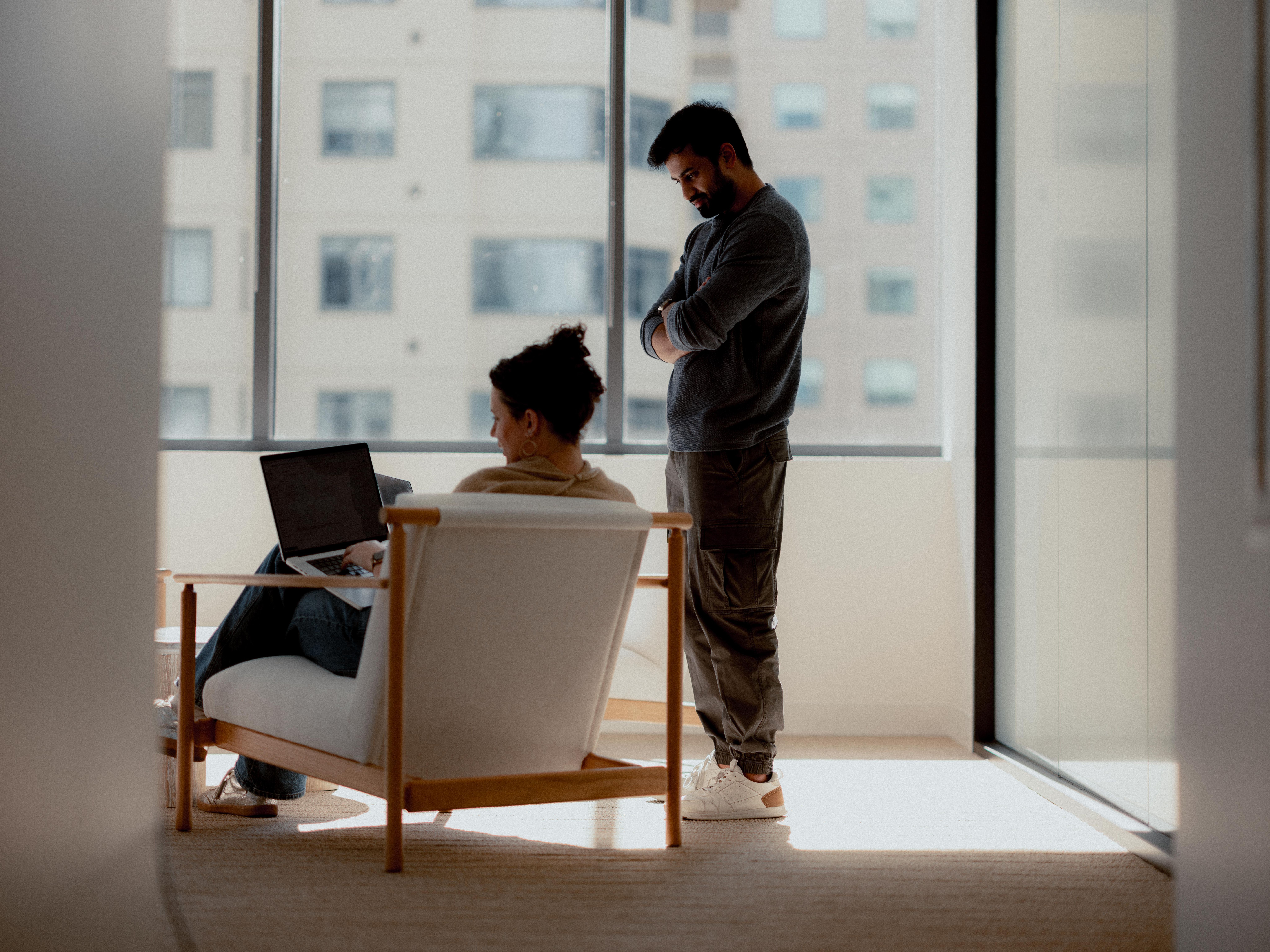 Sierra employees standing by a window