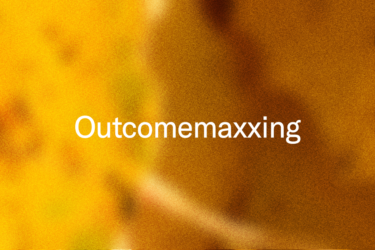 White text "Outcomemaxxing" on a blurry yellow and brown background.