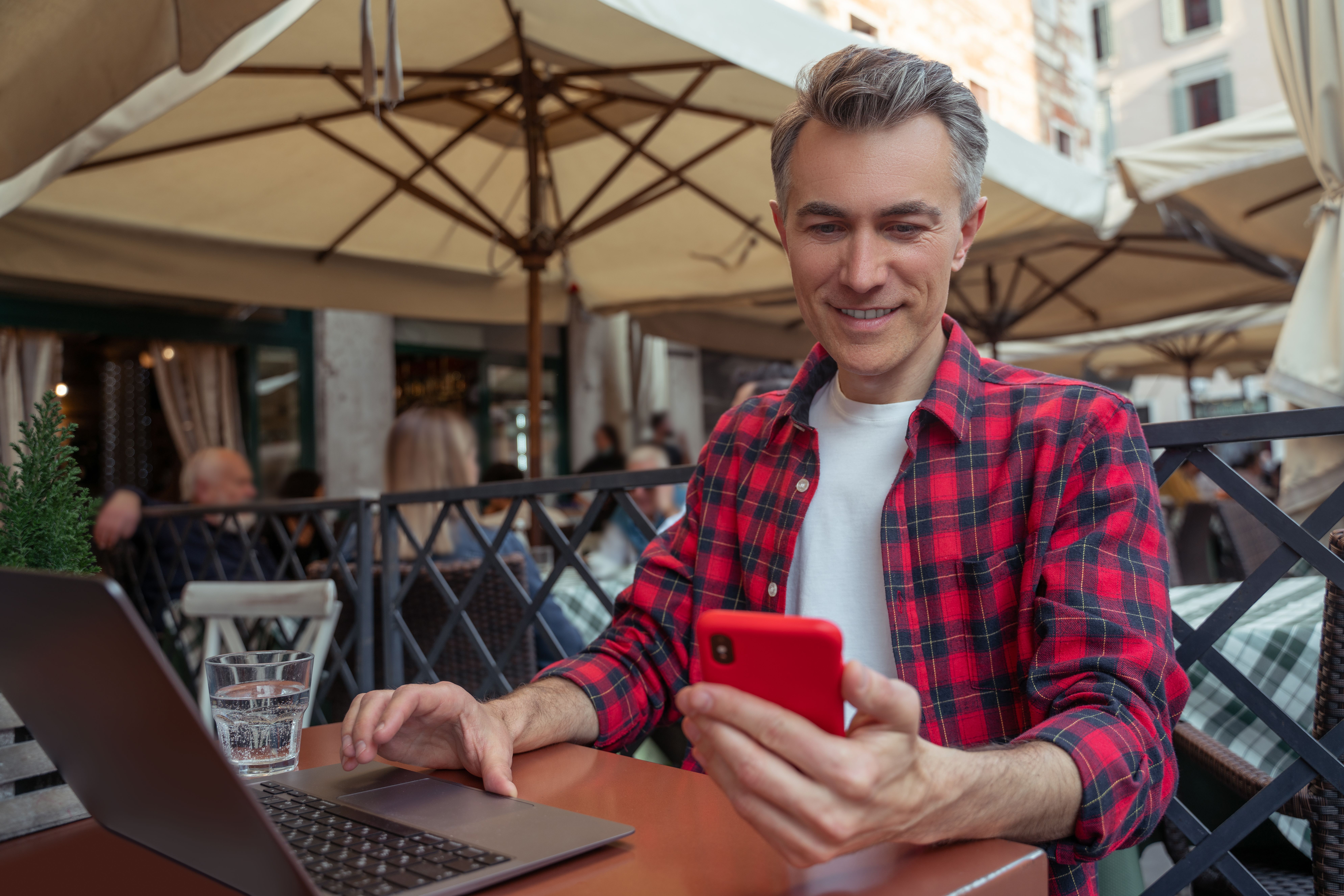 Man in cafe on computer